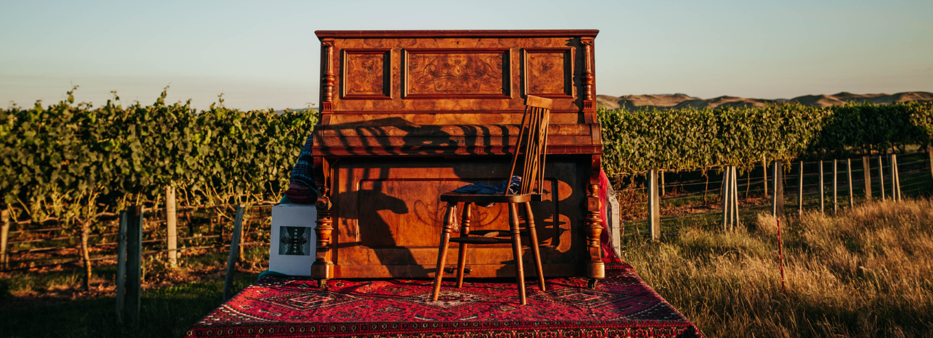 Piano and chair in Decibel Wines vineyard